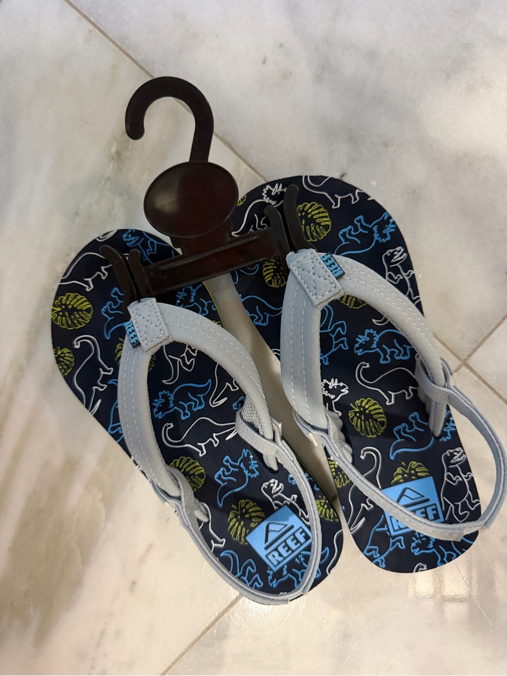 Reef Kids Flip Flops with Blue Dino Print and Light Gray Straps